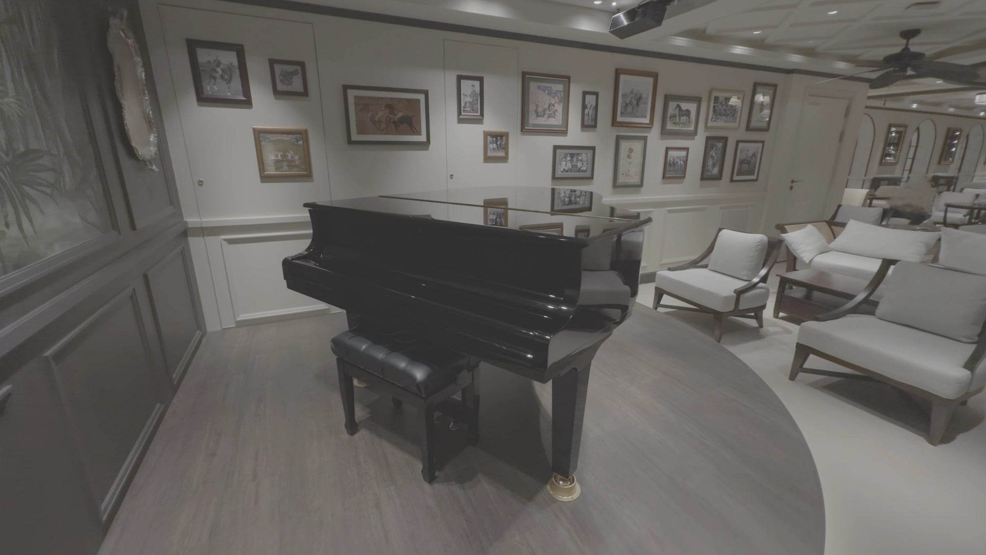 RAW Apple Log 2 Footage of a Grand piano in a room with framed pictures on the wall and gray chairs.