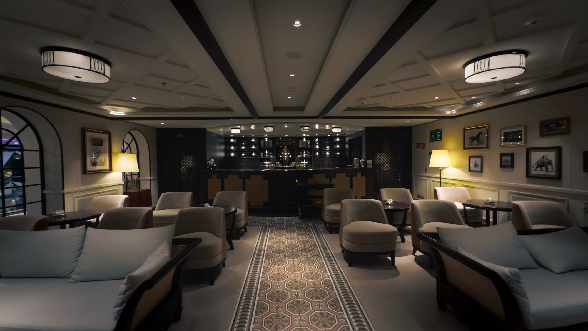 Color Graded Apple Log 2 Footage of a Luxury lounge with plush seating, a bar, and decorative elements.
